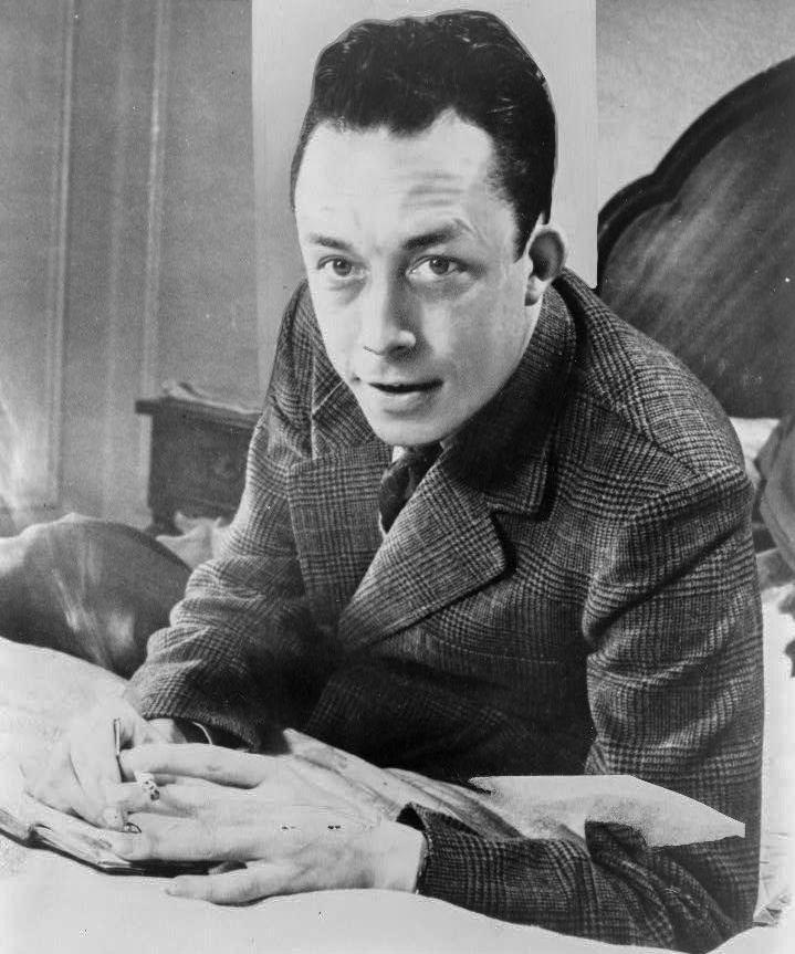 2026 02 26 albert camus wikypedia gagnant de prix nobel portrait en buste pose au bureau faisant face a gauche cigarette de tabagisme
